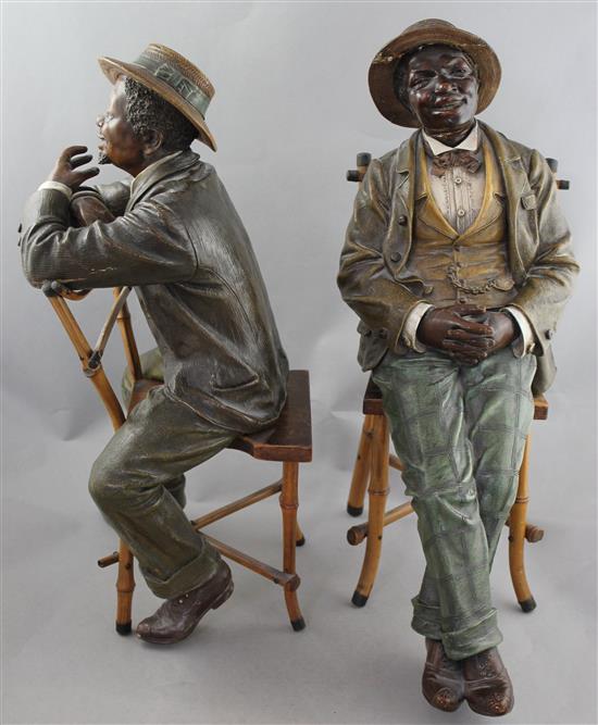 A pair of Johann Maresch Austrian painted terracotta figures, largest 18in., some damages